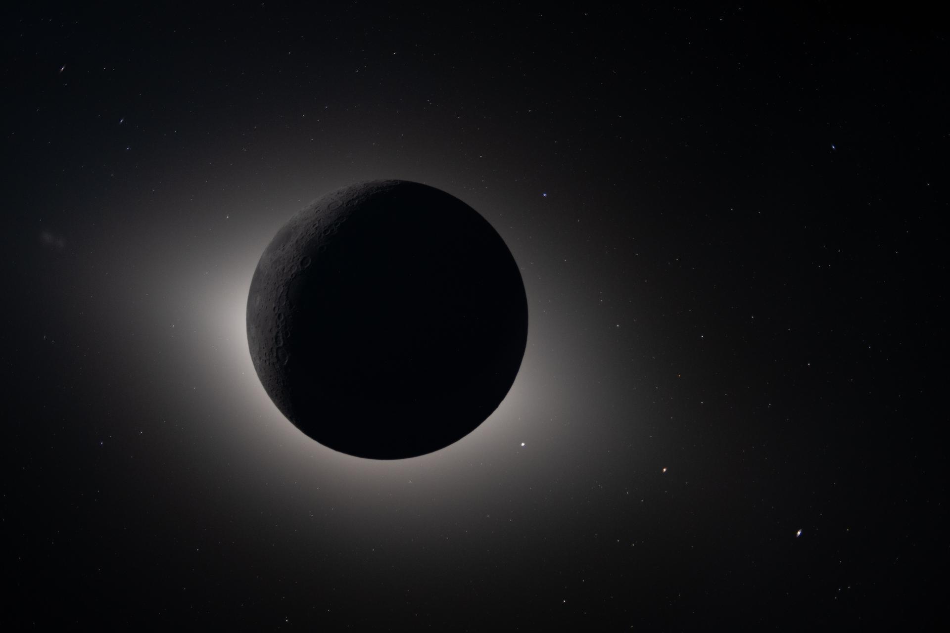 An image of the moon fully eclipsing the sun taken from the Artemis II mission.