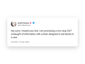 A tweet from Janel Comeau (@VeryBadLlama), verified, posted at 3:33 AM on 27 Sep 2023, reading: 'hey sorry I missed your text, I am processing a non-stop 24/7 onslaught of information with a brain designed to eat berries in a cave.'