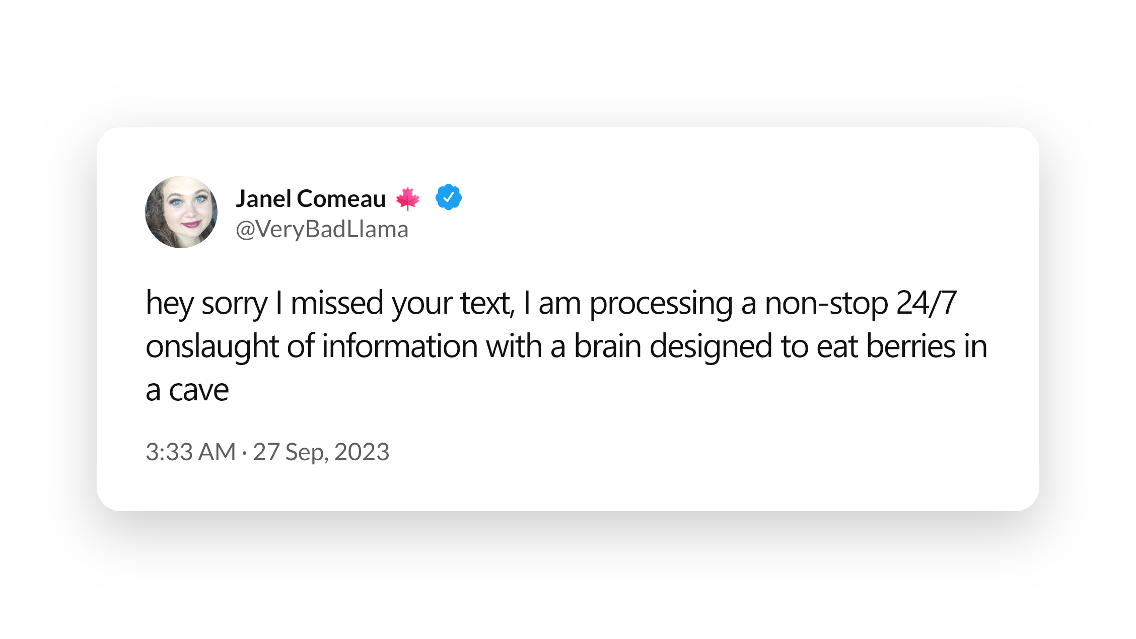 A tweet from Janel Comeau (@VeryBadLlama), verified, posted at 3:33 AM on 27 Sep 2023, reading: 'hey sorry I missed your text, I am processing a non-stop 24/7 onslaught of information with a brain designed to eat berries in a cave.'